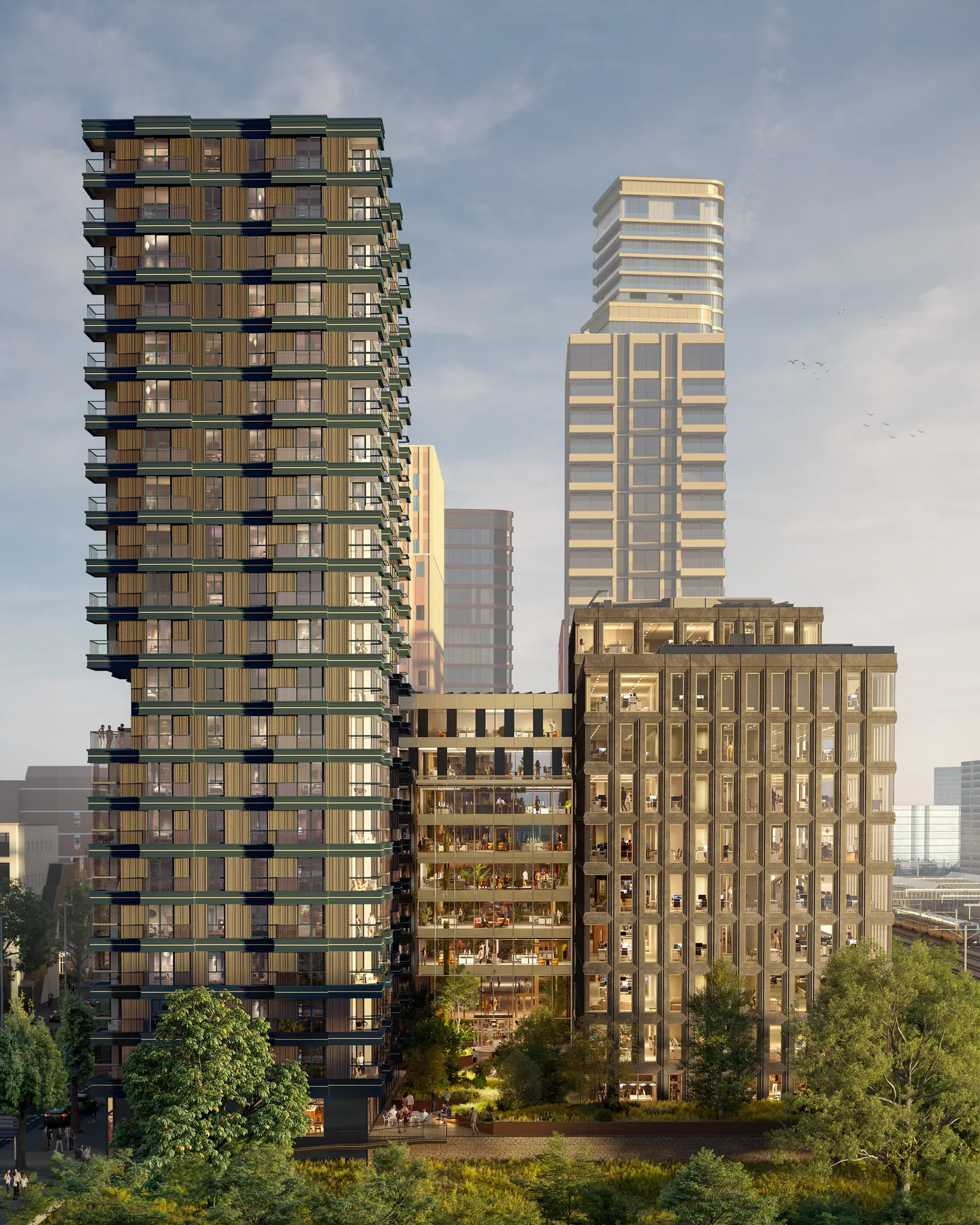 Impression of EDGE Eindhoven next to the railway, with the residential tower on the left and the office building on the right