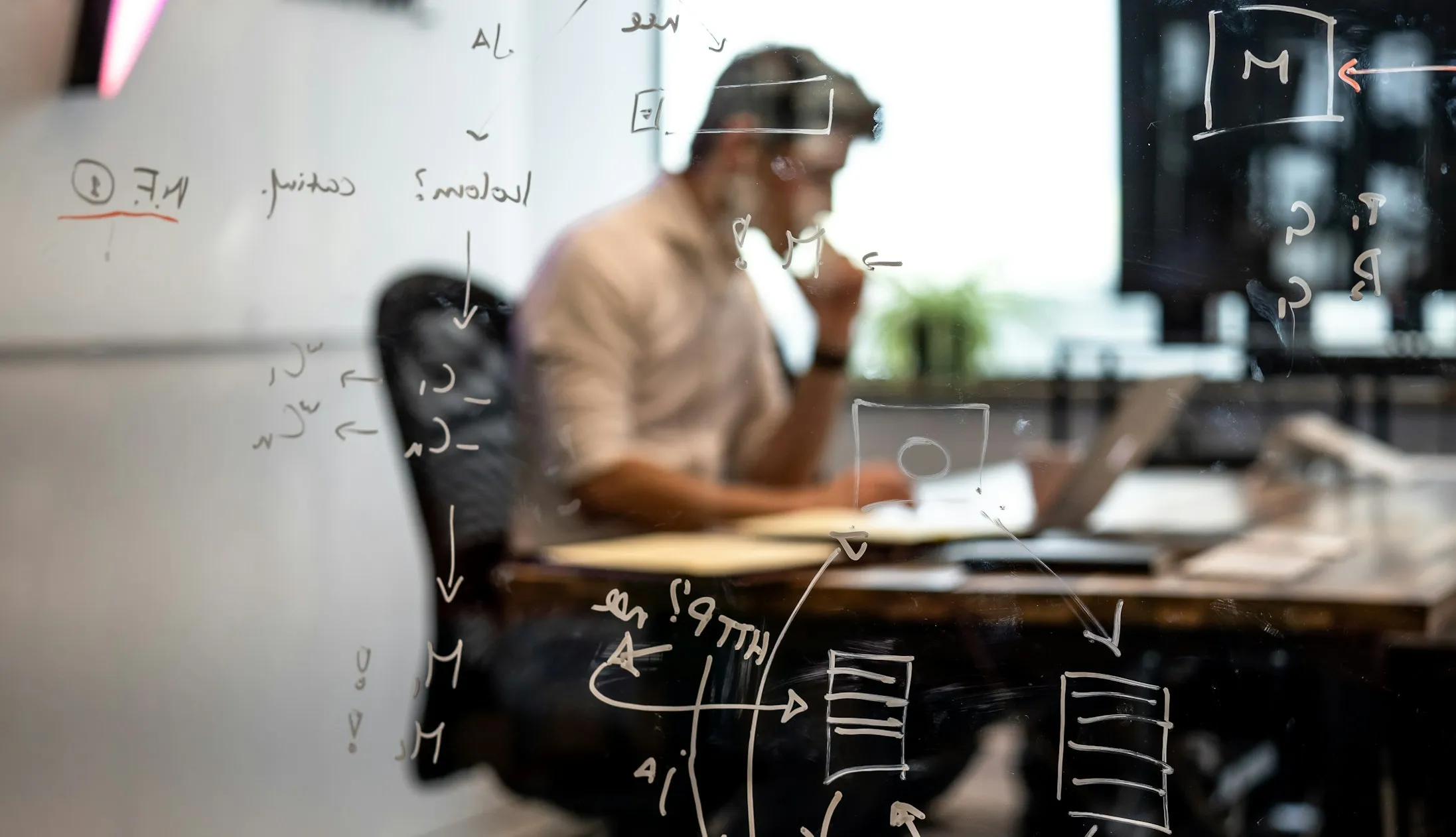 Glenn Bergmans blurred with algorithms in front